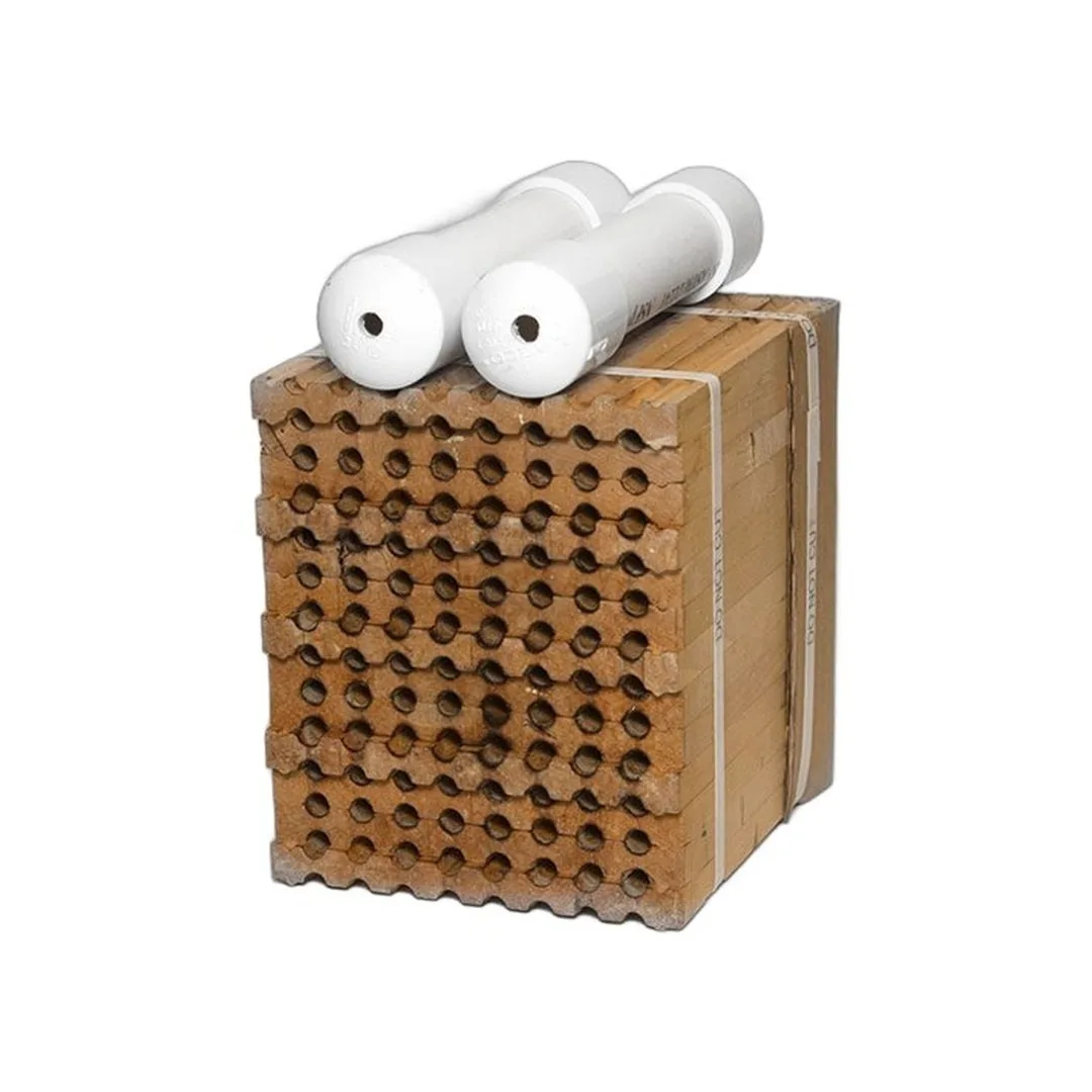 Mason bee nesting block with two white emergence tubes